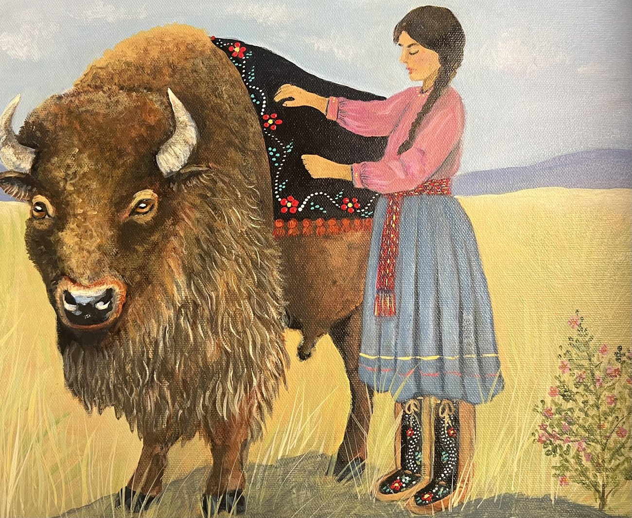 Cover art for Papaashi Bufloo: a M&eacute;tis girl dressing a buffalo in a beaded blanket on the prairie